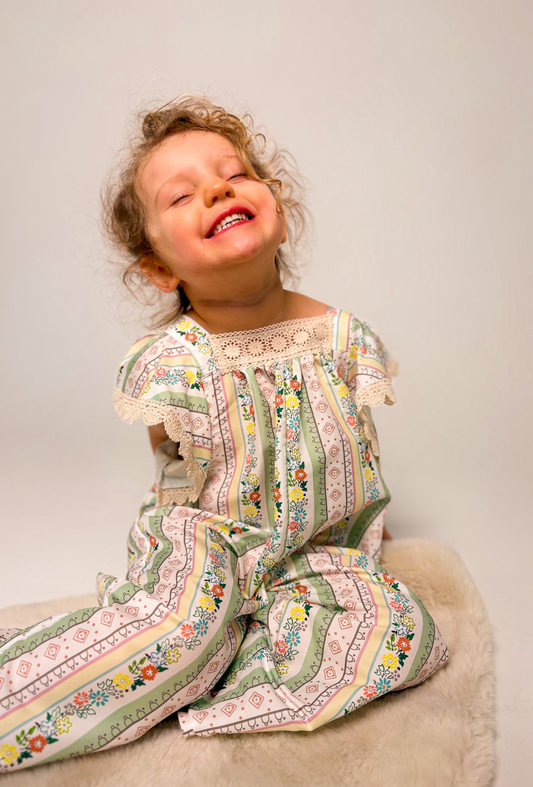 PRINTED FLUTTER SLEEVE JUMPSUIT - Vintage Blossom