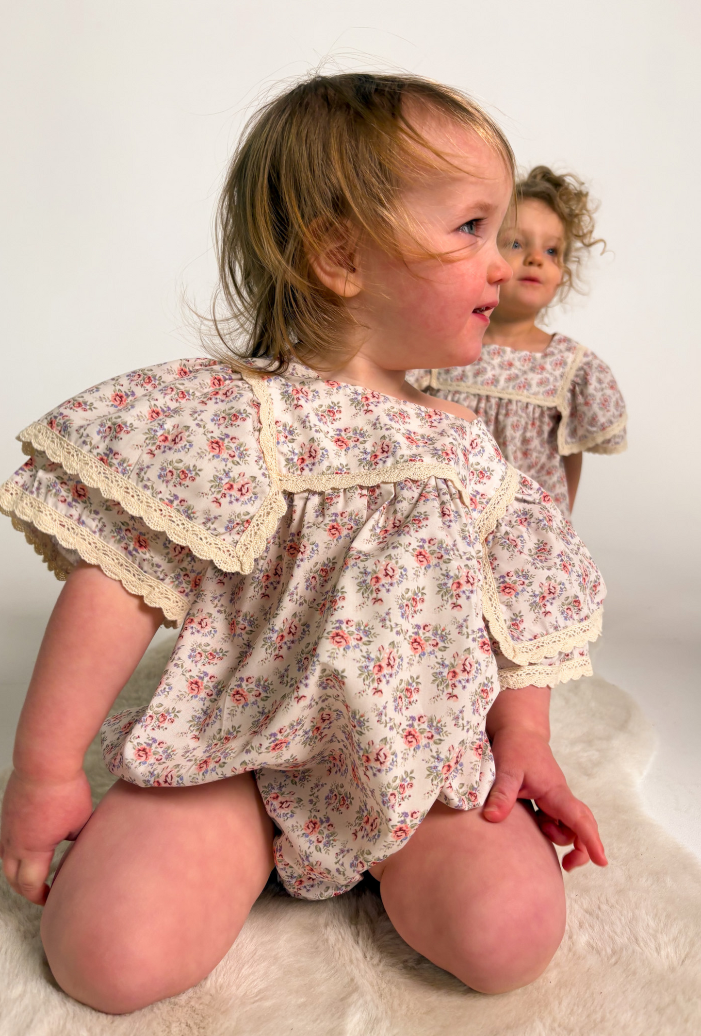 FLUTTER SLEEVE ROMPER