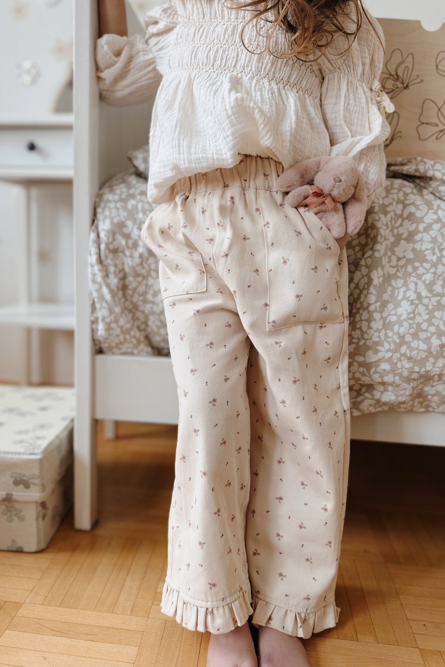 Girls oversized floral trousers with frilled hem