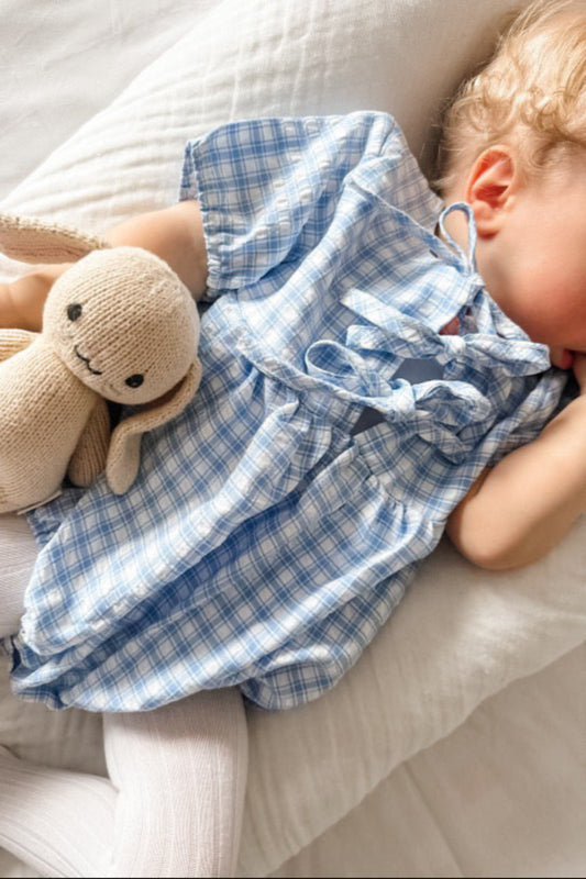 Baby girl blue and white gingham romper with front bow ties