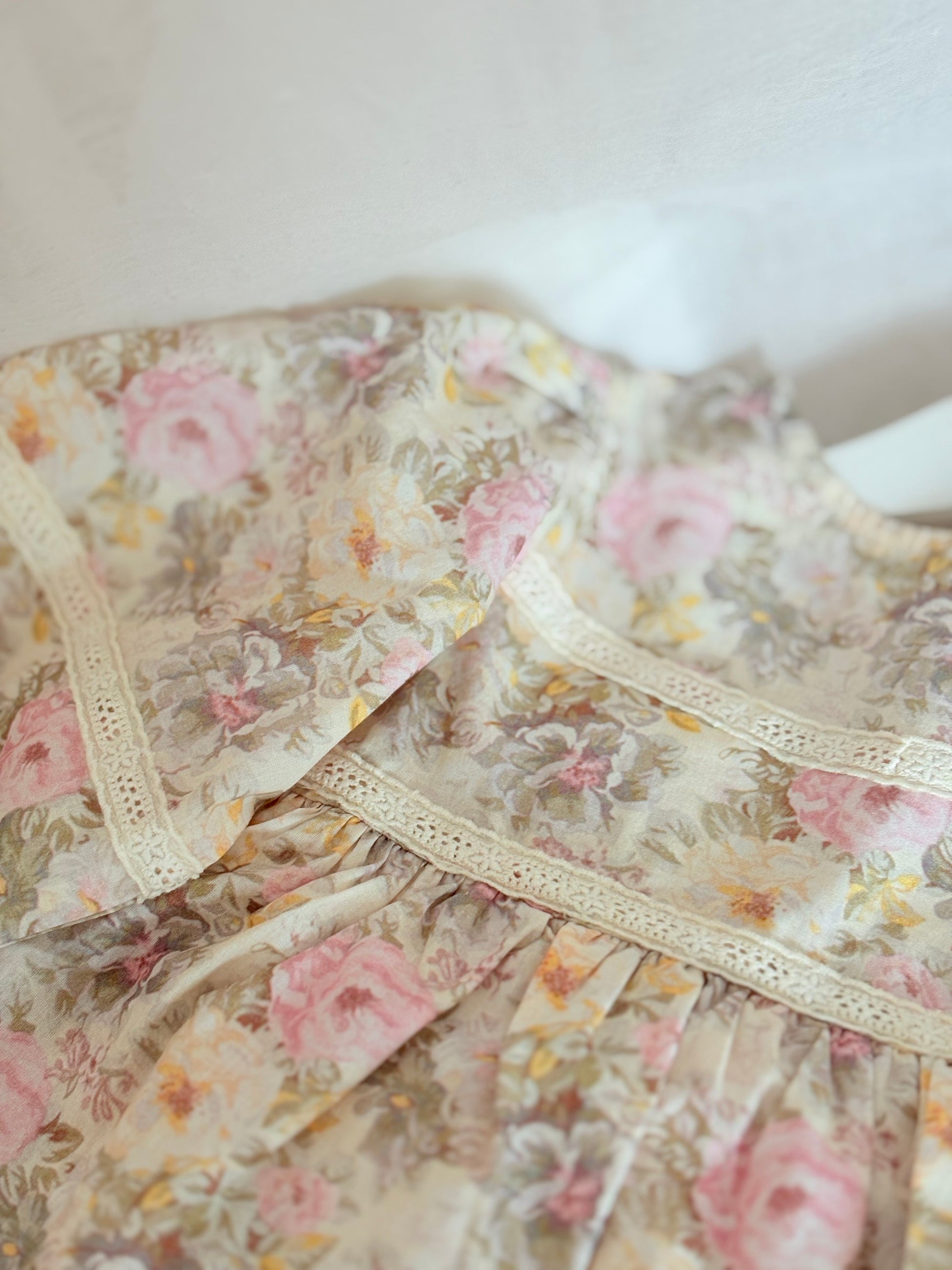 Baby girls long sleeved pink floral romper
