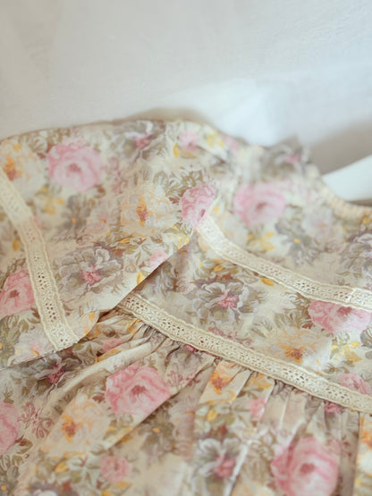 Baby girls long sleeved pink floral romper