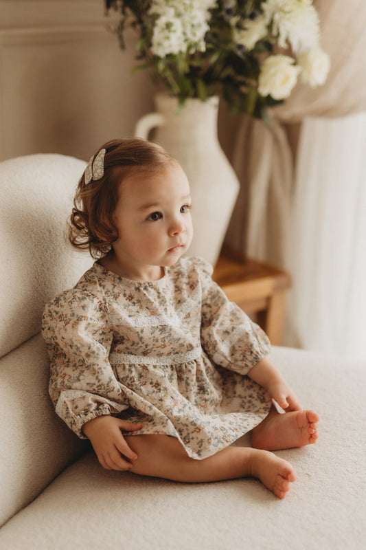 Beige floral skirted romper