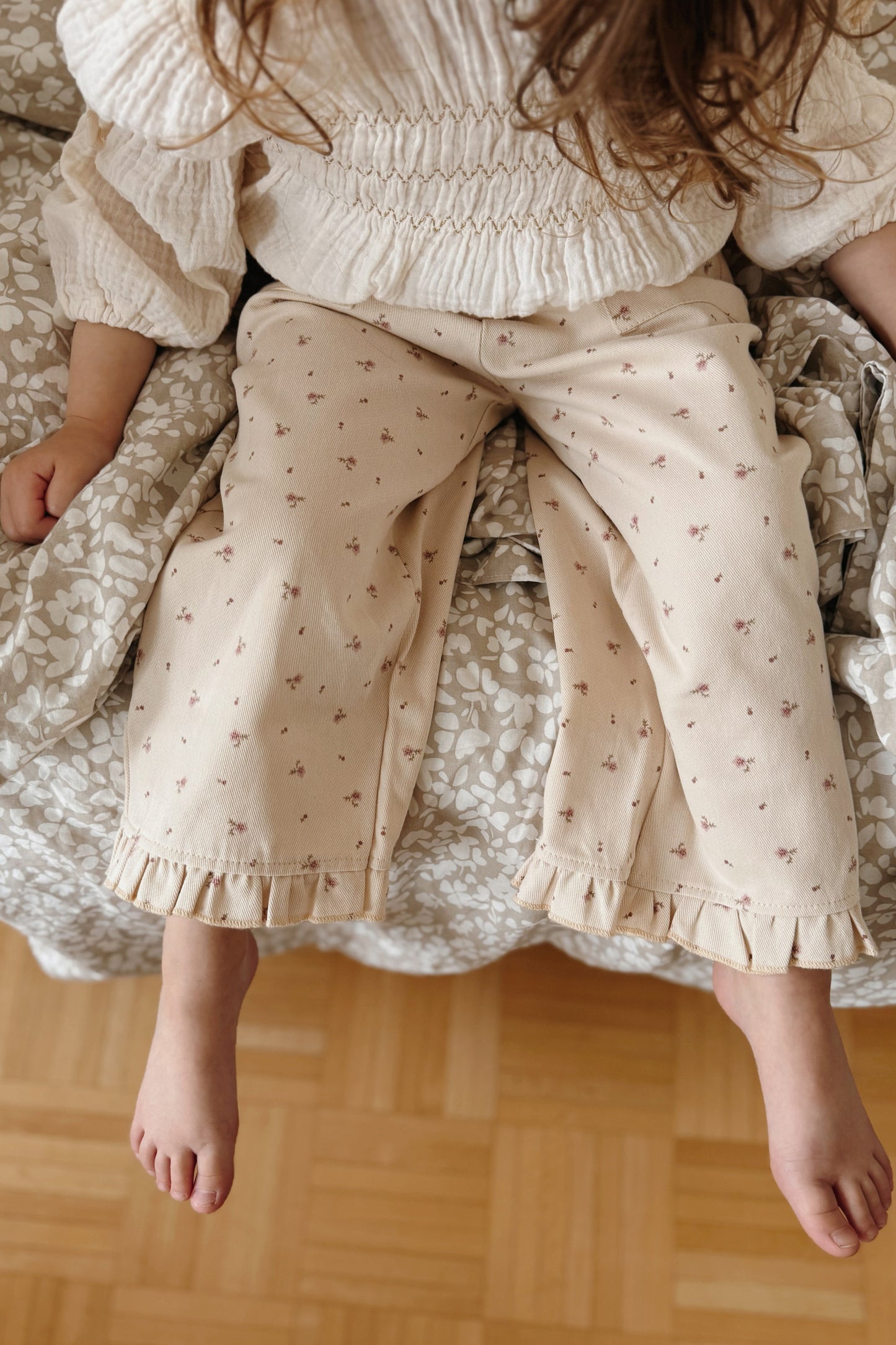 Girls oversized floral trousers with frilled hem