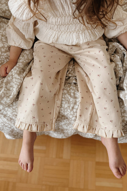Girls oversized floral trousers with frilled hem