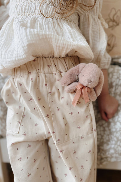 Girls oversized floral trousers with frilled hem